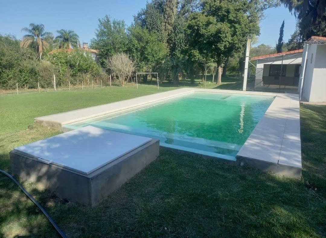 Foto de Casa en venta patio verde y pileta la ribera oliveros, imagen 1