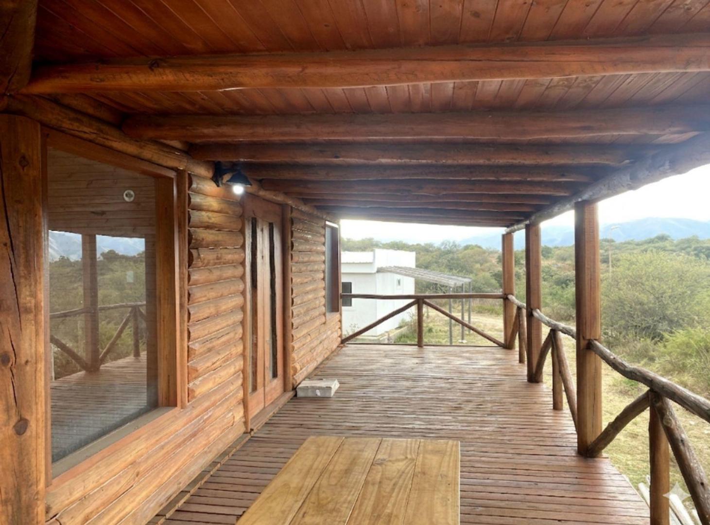 Foto de VENTA CABAÑA 2 DORM BARRIO SEMICERRADO LA FALDA, imagen 2