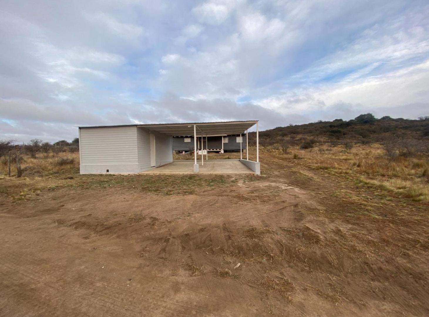 Foto de VENTA CABAÑA 2 DORM CON DOBLE COCHERA LA FALDA, imagen 1