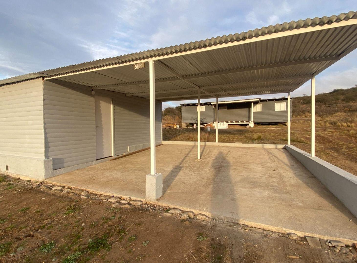 Foto de VENTA CABAÑA 2 DORM CON DOBLE COCHERA LA FALDA, imagen 2