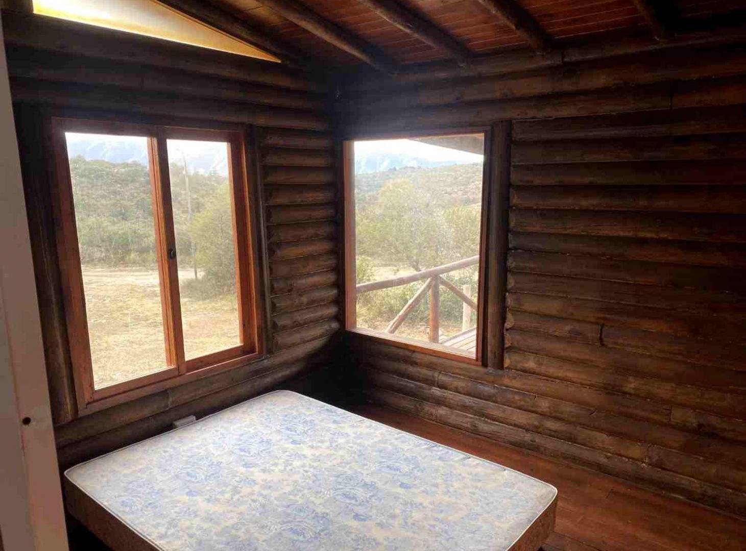 Foto de VENTA CABAÑA 2 DORM BARRIO SEMICERRADO LA FALDA, imagen 3