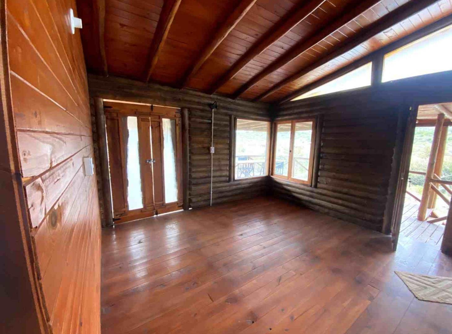 Foto de VENTA CABAÑA 2 DORM BARRIO SEMICERRADO LA FALDA, imagen 4