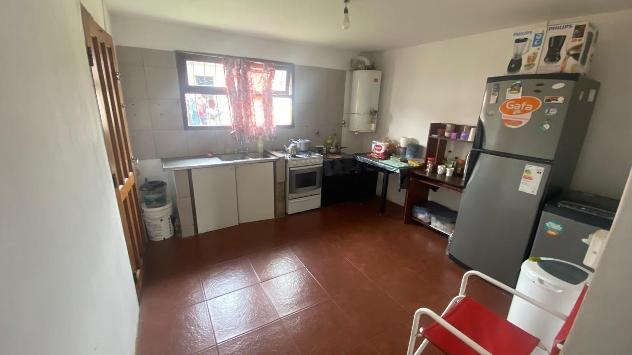 Foto de VENTA CASA 3 AMBIENTES MAS DOS DEPARTAMENTOS A TERMINAR.ZONA MALVINAS, imagen 2