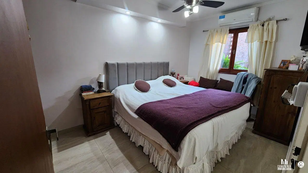 Departamento de tres dormitorios y cochera 4