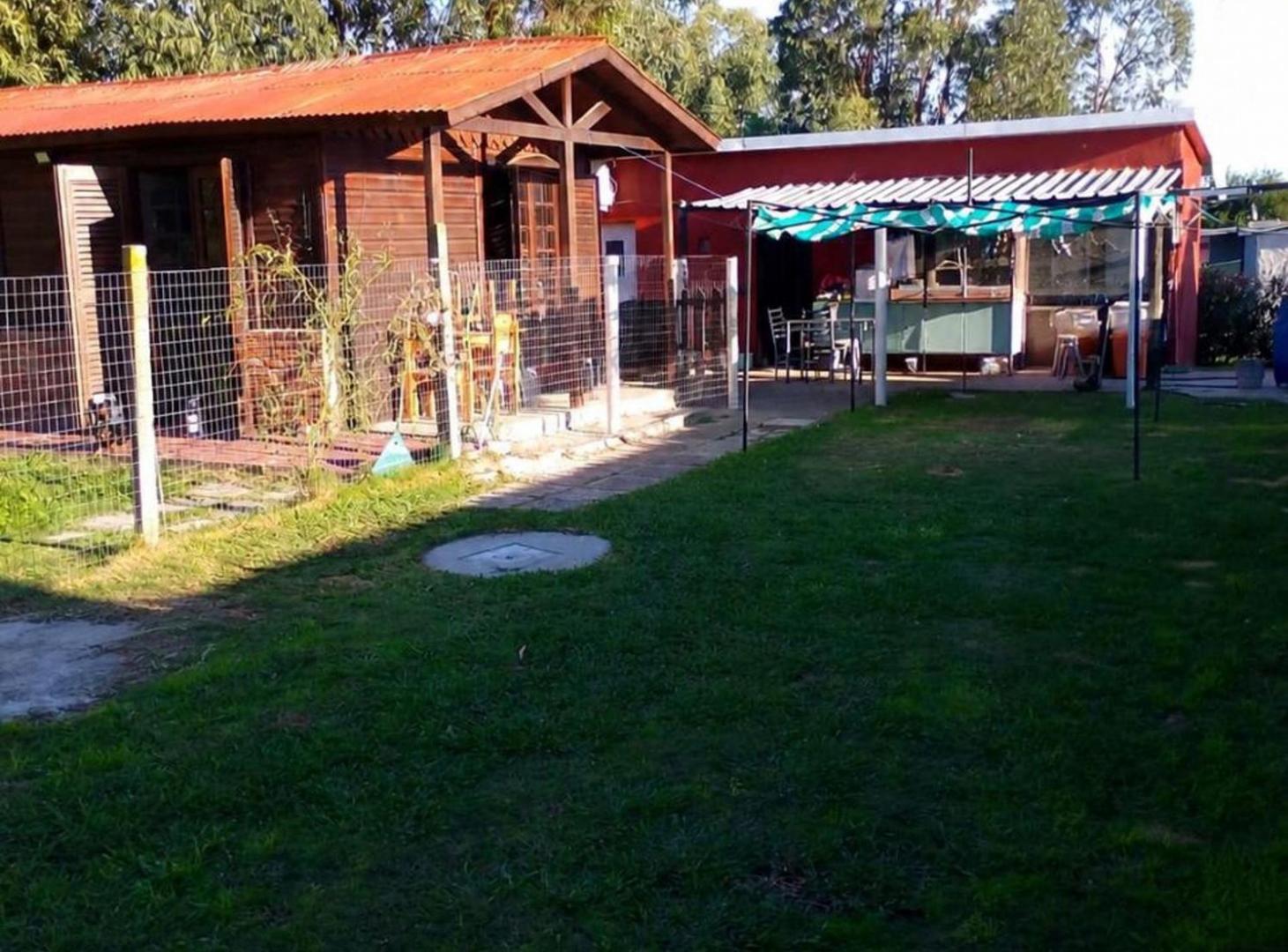 Foto de VENTA 2 CASAS 1 Y 2 DORMITORIOS SAN LUIS SUR, imagen 1
