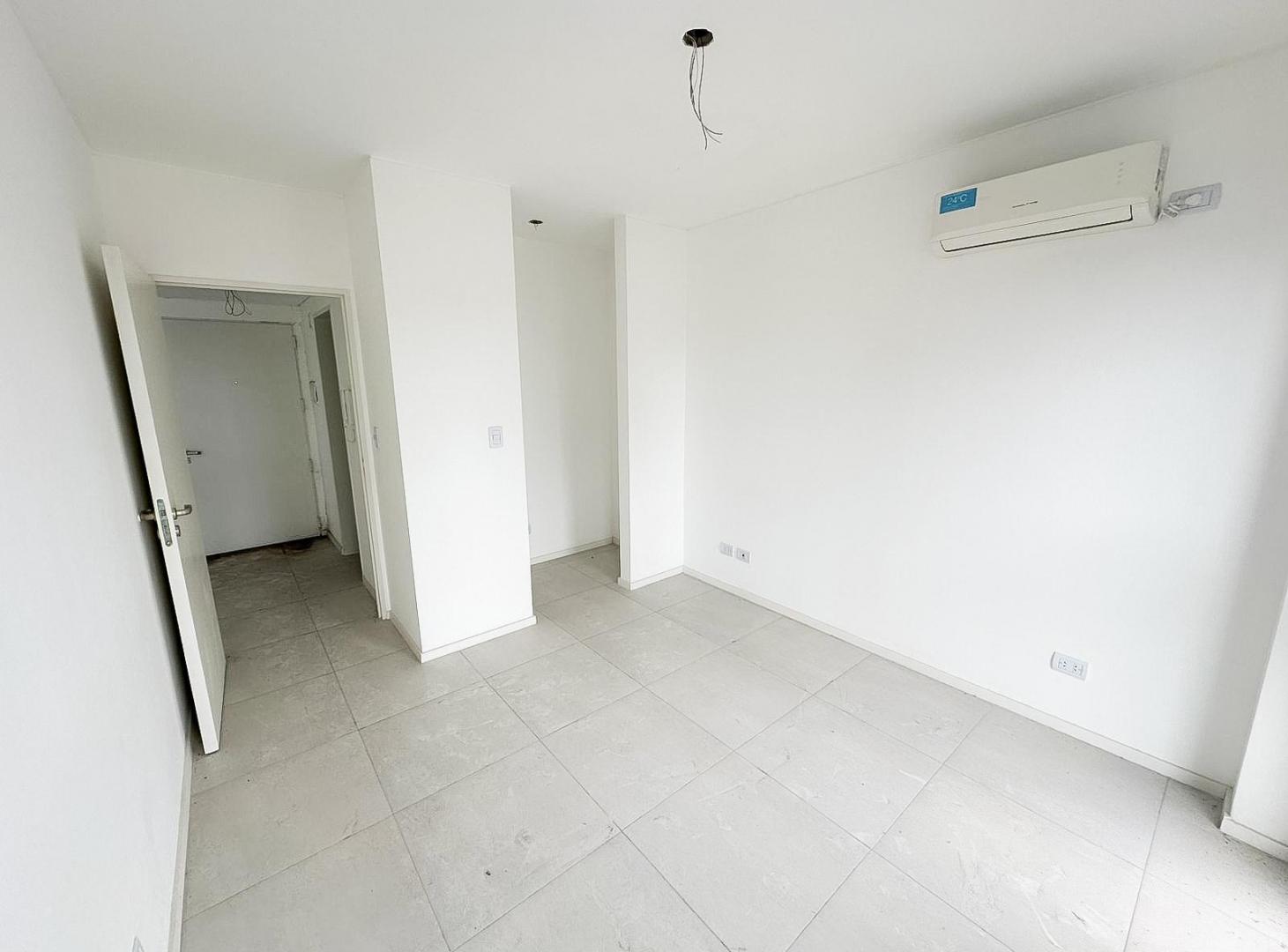 Foto de DEPARTAMENTO EN VENTA DE 1 DORMITORIO CON COCHERA EN PUERTO NORTE, imagen 2