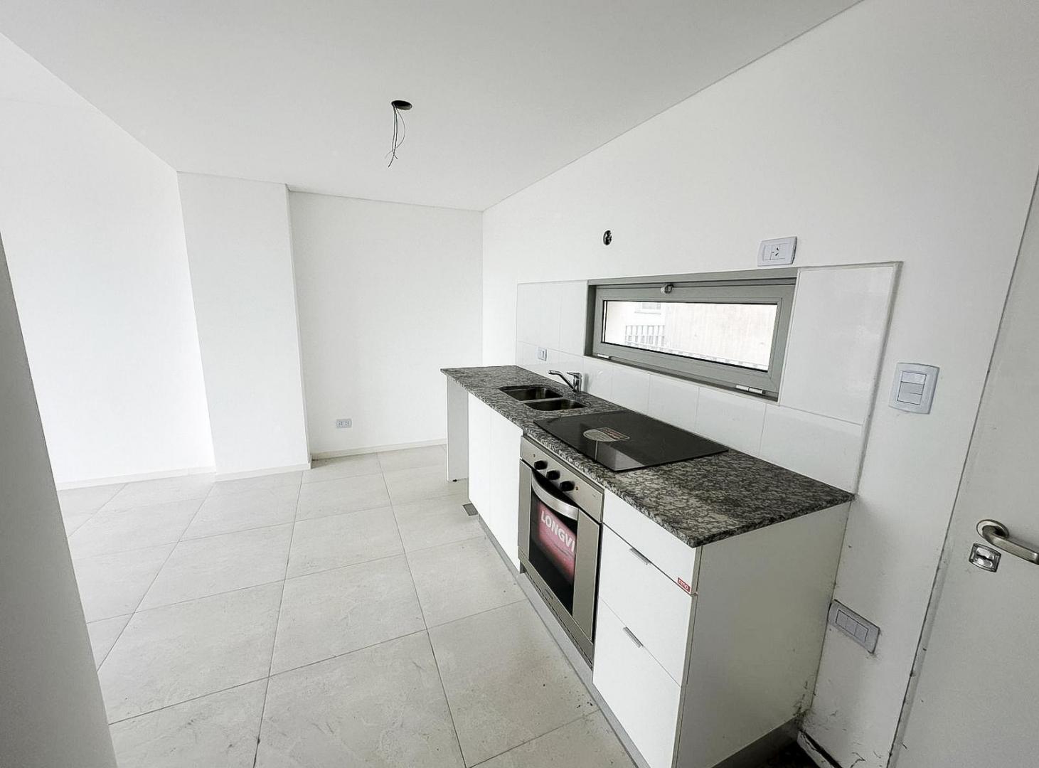 Foto de DEPARTAMENTO EN VENTA DE 1 DORMITORIO CON COCHERA EN PUERTO NORTE, imagen 4