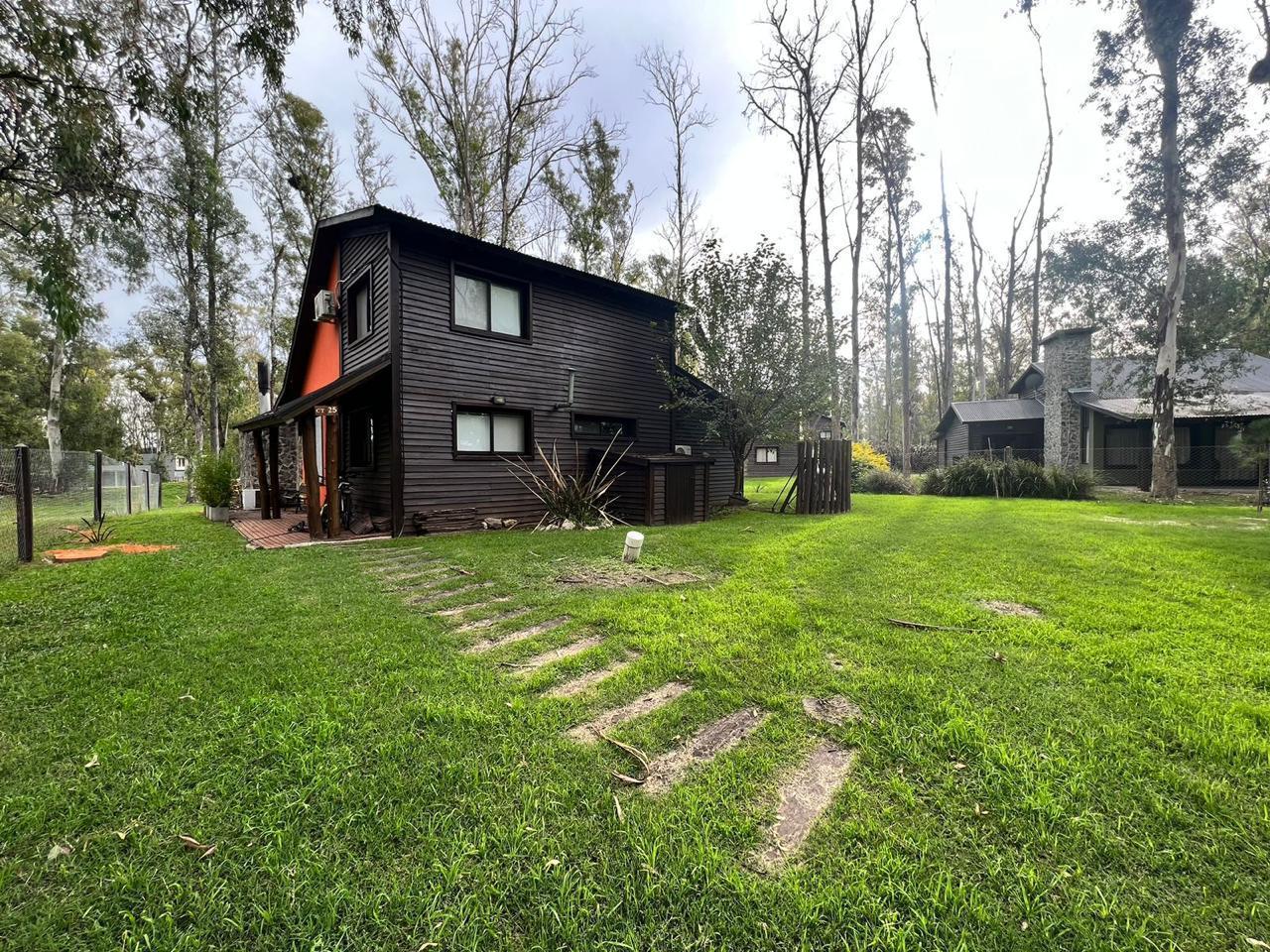 Foto de VENTA - CASA DE DOS DORMITORIOS CAMPO TIMBO LOTE AL GOLF, imagen 1