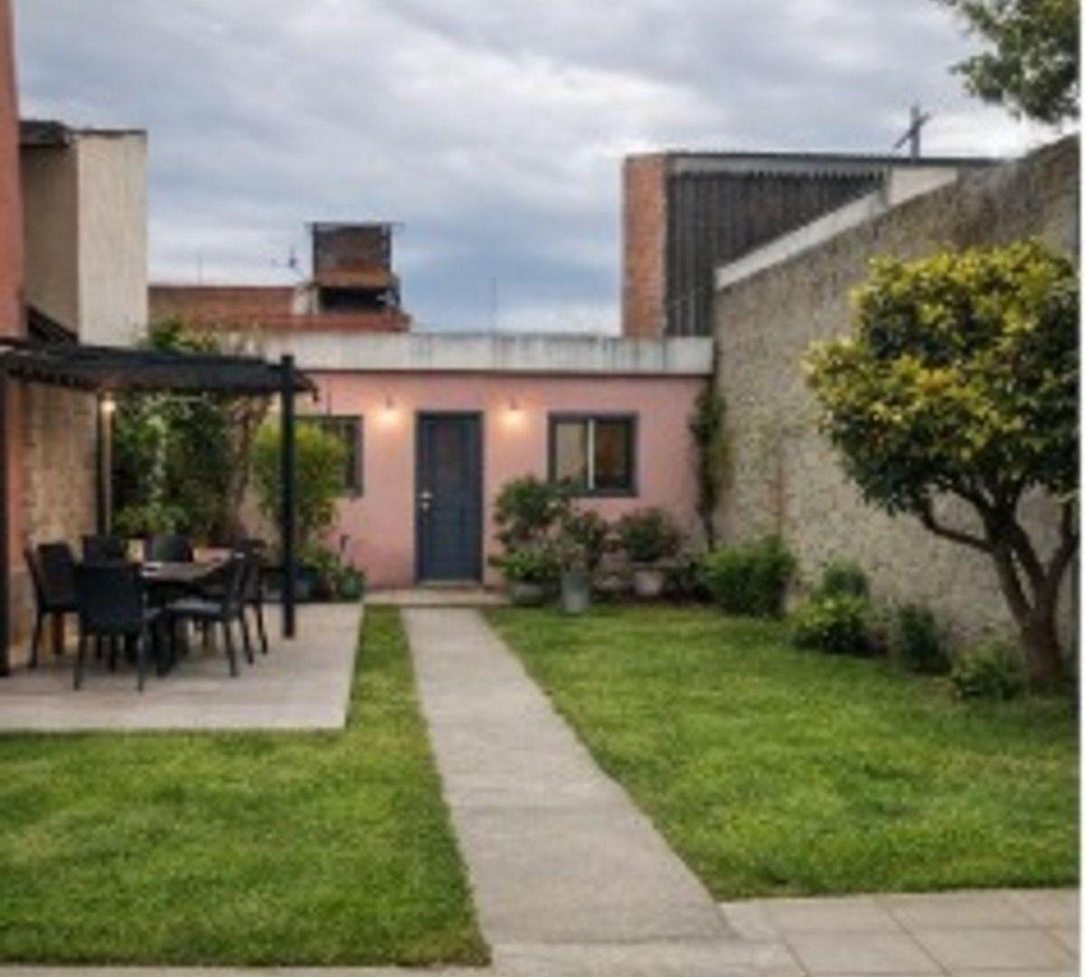 Foto de Casa multifamiliar con cochera, patio y terreno, imagen 4
