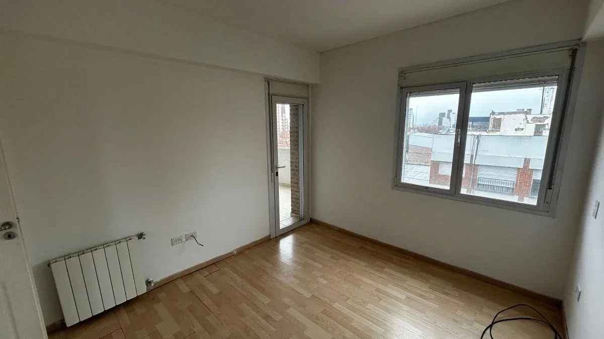 DEPARTAMENTO DE 2 DORMITORIOS EN ALQUILER en Pionero 2 CON COCHERA CUBIERTA centro de Cipolletti 3