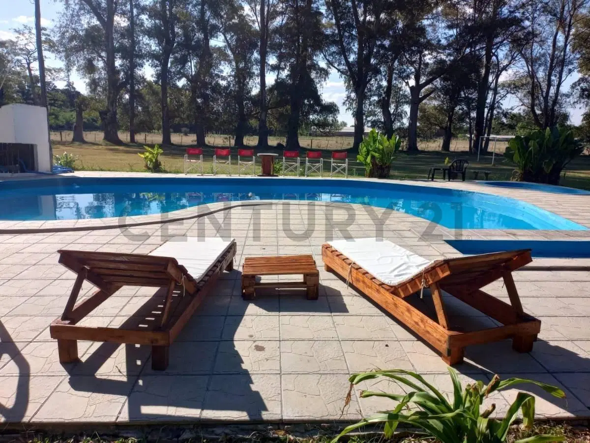 QUINTA VACACIONAL CON CABAÑAS PARA HOSPEDAJE EN VENTA,  EN GRAL RODRIGUEZ. 2