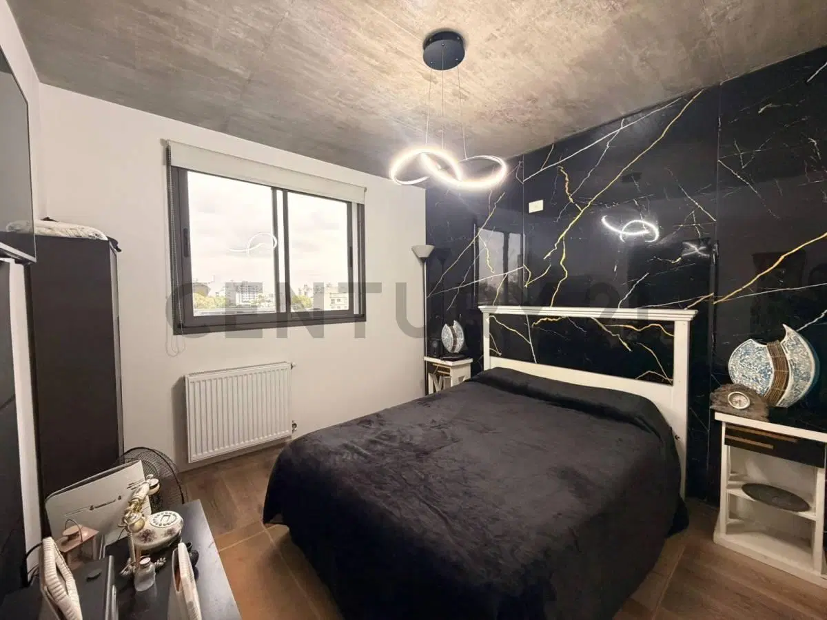 VENTA ESPECTACULAR DEPTO NUEVO 2 AMB. COCHERA, SUM, BALCON ATERRAZAD0. ACEPTA PERMUTA 2