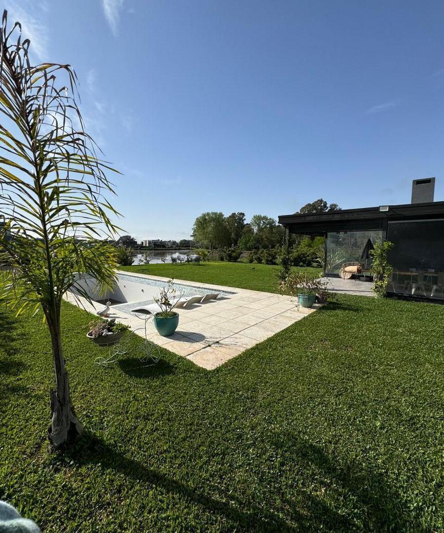 Foto de VENTA CASA 5 AMBIENTES BARRIO SAN ELISEO CON PILETA A LA LAGUNA, imagen 1