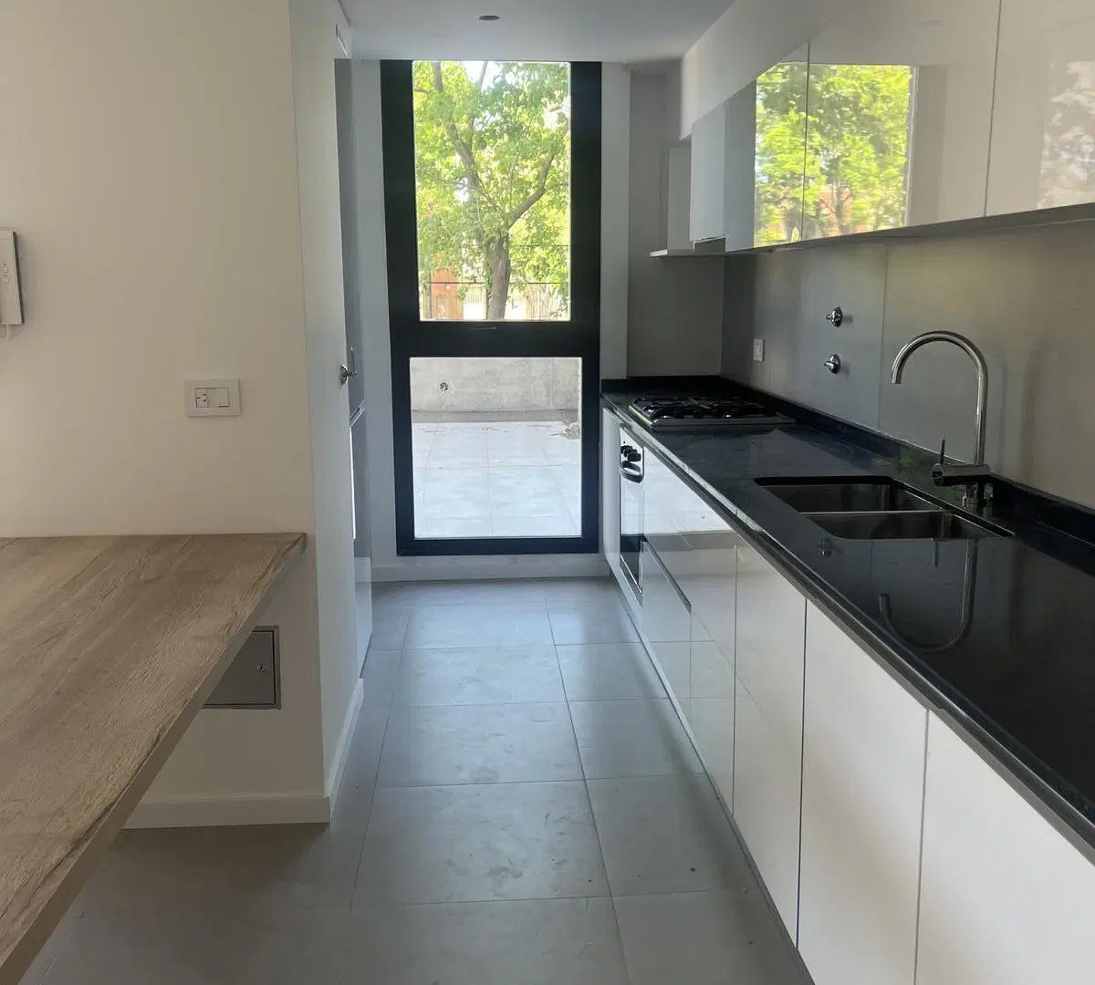 VENTA DEPARTAMENTO 1 DORMITORIO A ESTRENAR CON COCHERA Y PATIO EN CONDOMINIOS PADDOCK- FISHERTON! 4