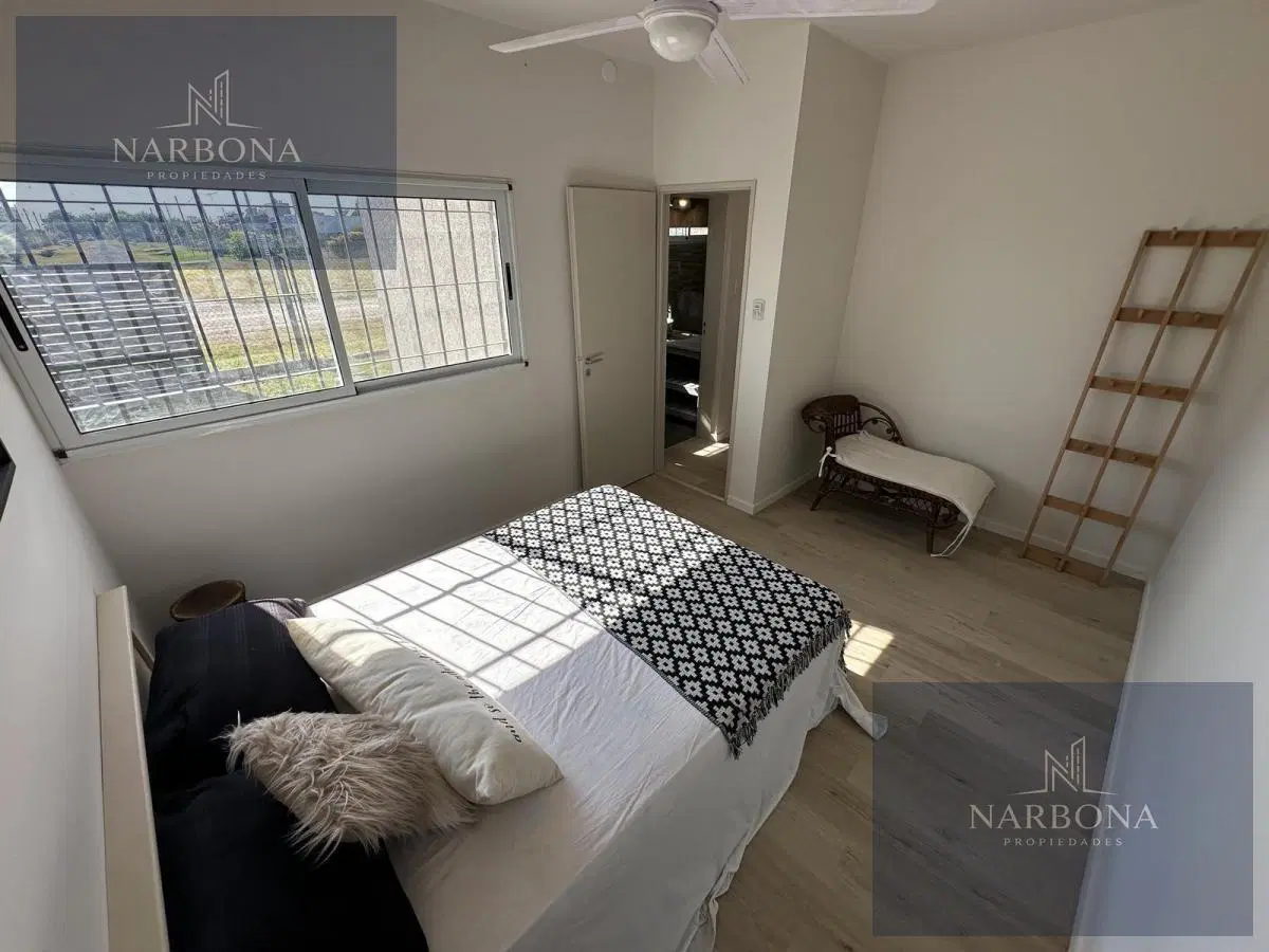 VENTA CASA 2 DORMITORIOS CON COCHERA, QUINCHO Y PILETA EN FUNES TOWN 5