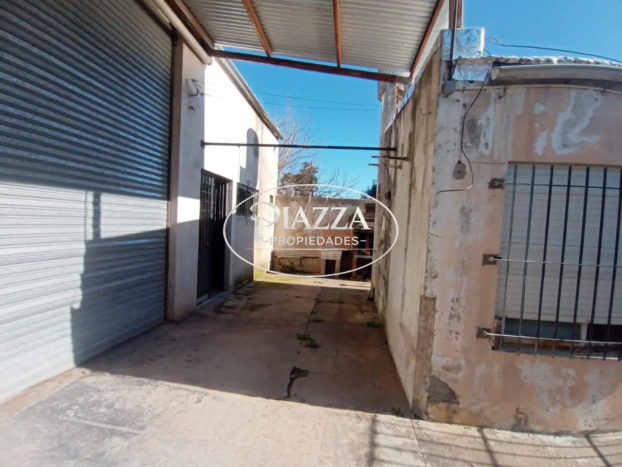 Casa 2 dormis - Cochera y Salón de usos múltiples - Los Hornos 3