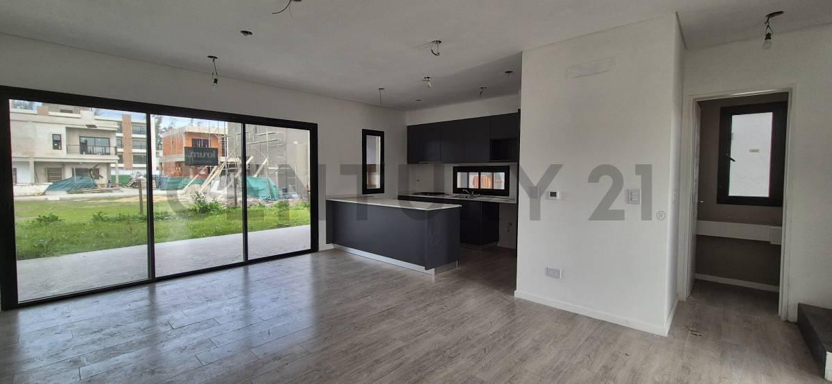 Foto de Casa Dúplex con jardín y parrilla en Spring Park en Pilar, imagen 1