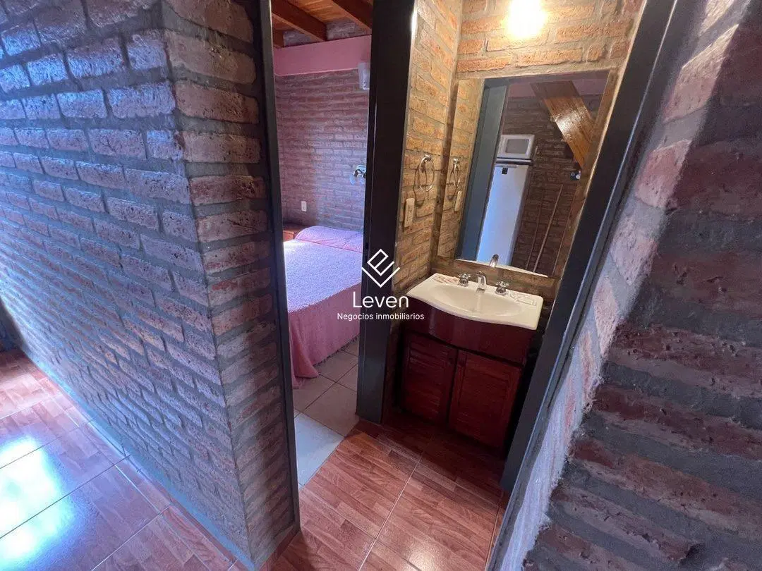 VENTA HOTEL  5  DUPLEX AMOBLADOS, FUNCIONANDO CON ALTA RENTA , BARRIO SANTA RITA CARLOS PAZ 3