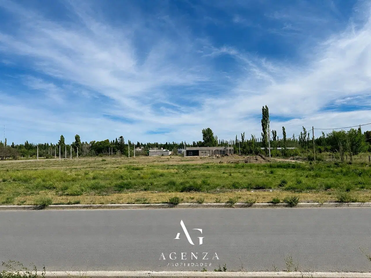 VENTA LOTE COMERCIAL FRENTE A RUTA B° MANZANAR DE PLOTTIER 8