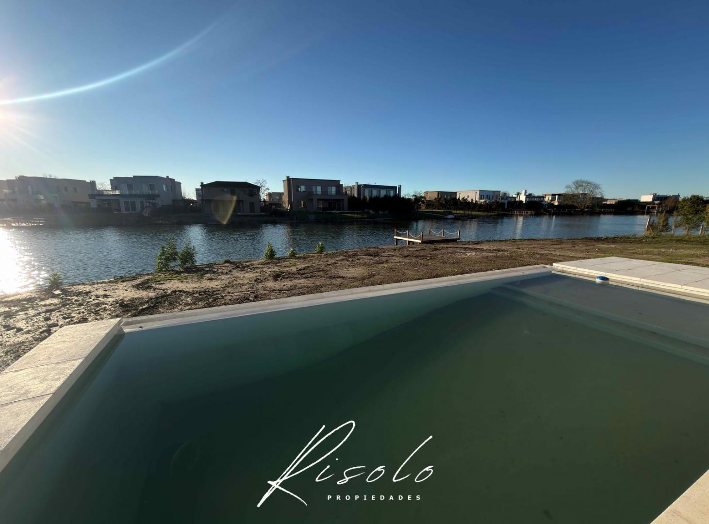 Foto de Casa en Venta con lote a la Laguna. 3 dormitorios, Pileta. Barrio, imagen 4