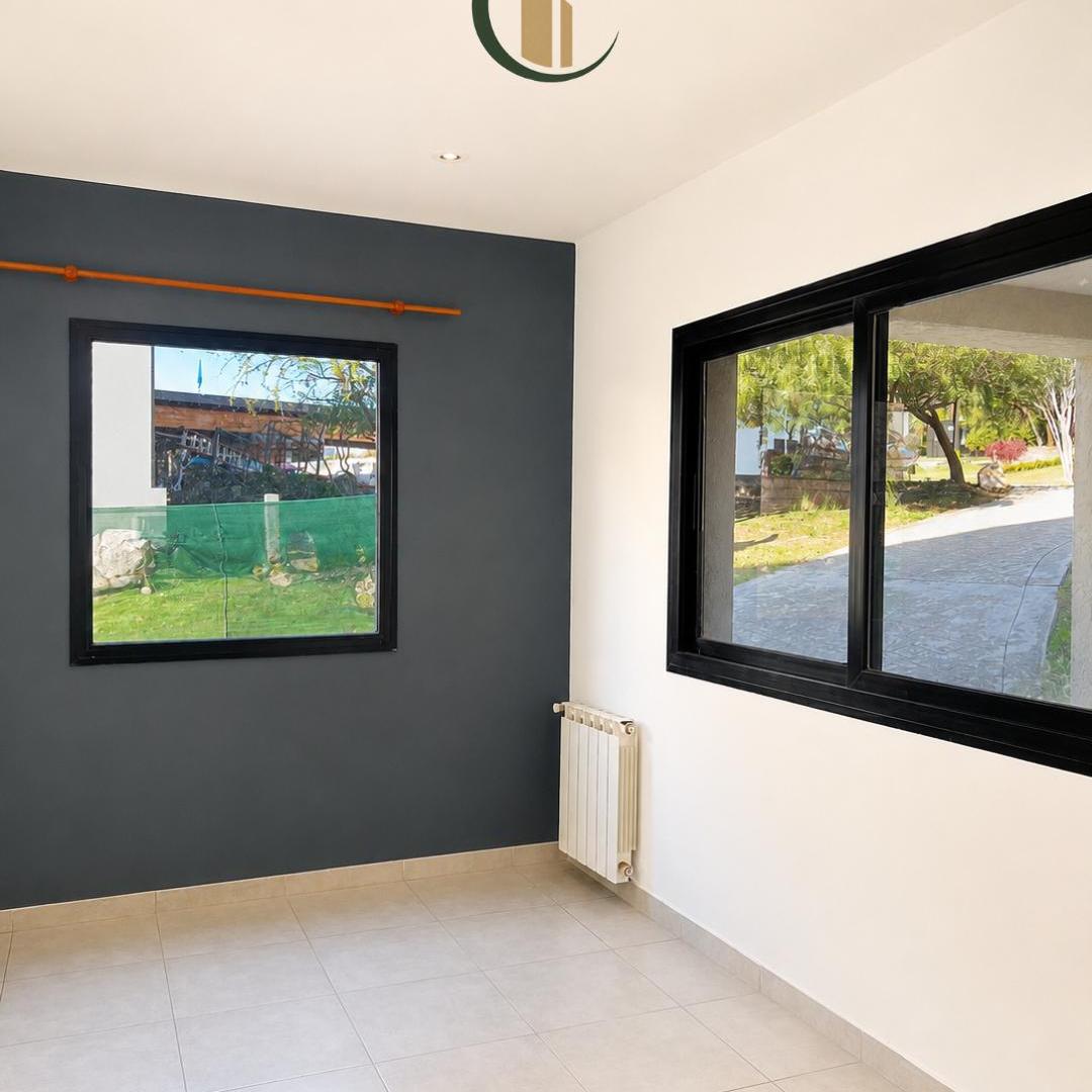 Foto de Dúplex en La Cuesta - Pileta y jardín plano, imagen 1
