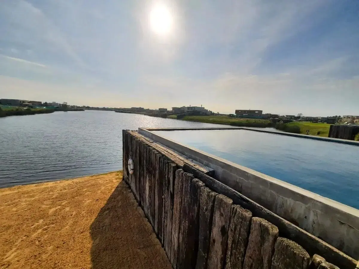 VENTA DE LOTE EN EL NAUDIR CON AMARRA PROPIA 8