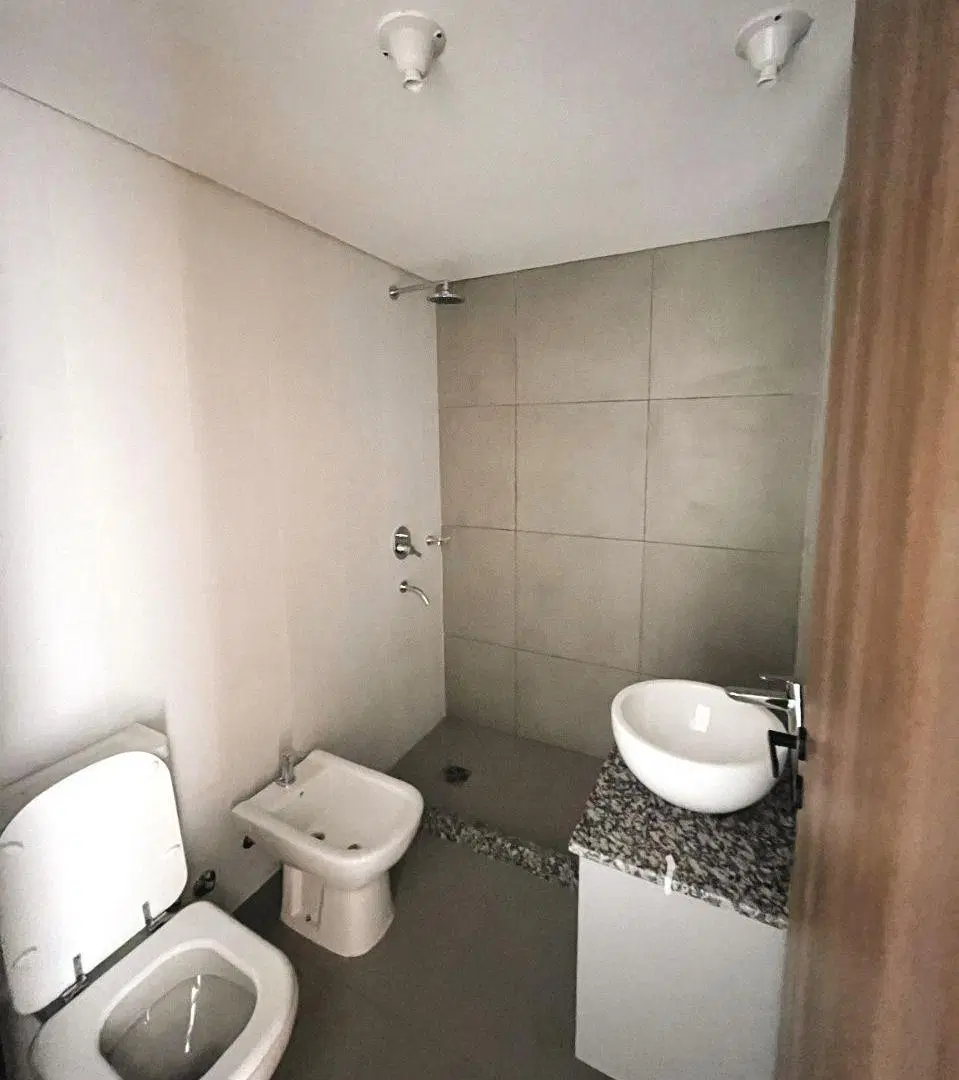Departamento de 1 dormitorio con amplio deck en gran complejo de condominios Botania 4