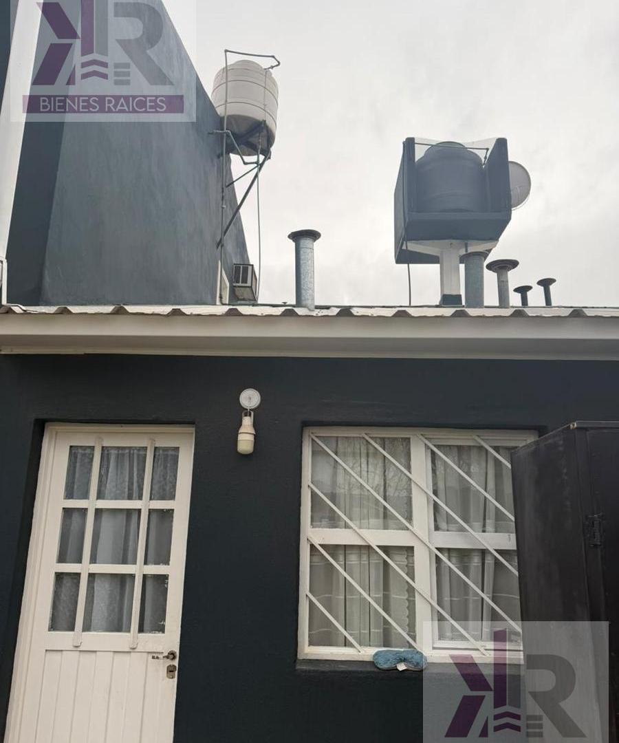 Foto de Casa con garaje y quincho en venta - Centenario, Neuquén, imagen 4