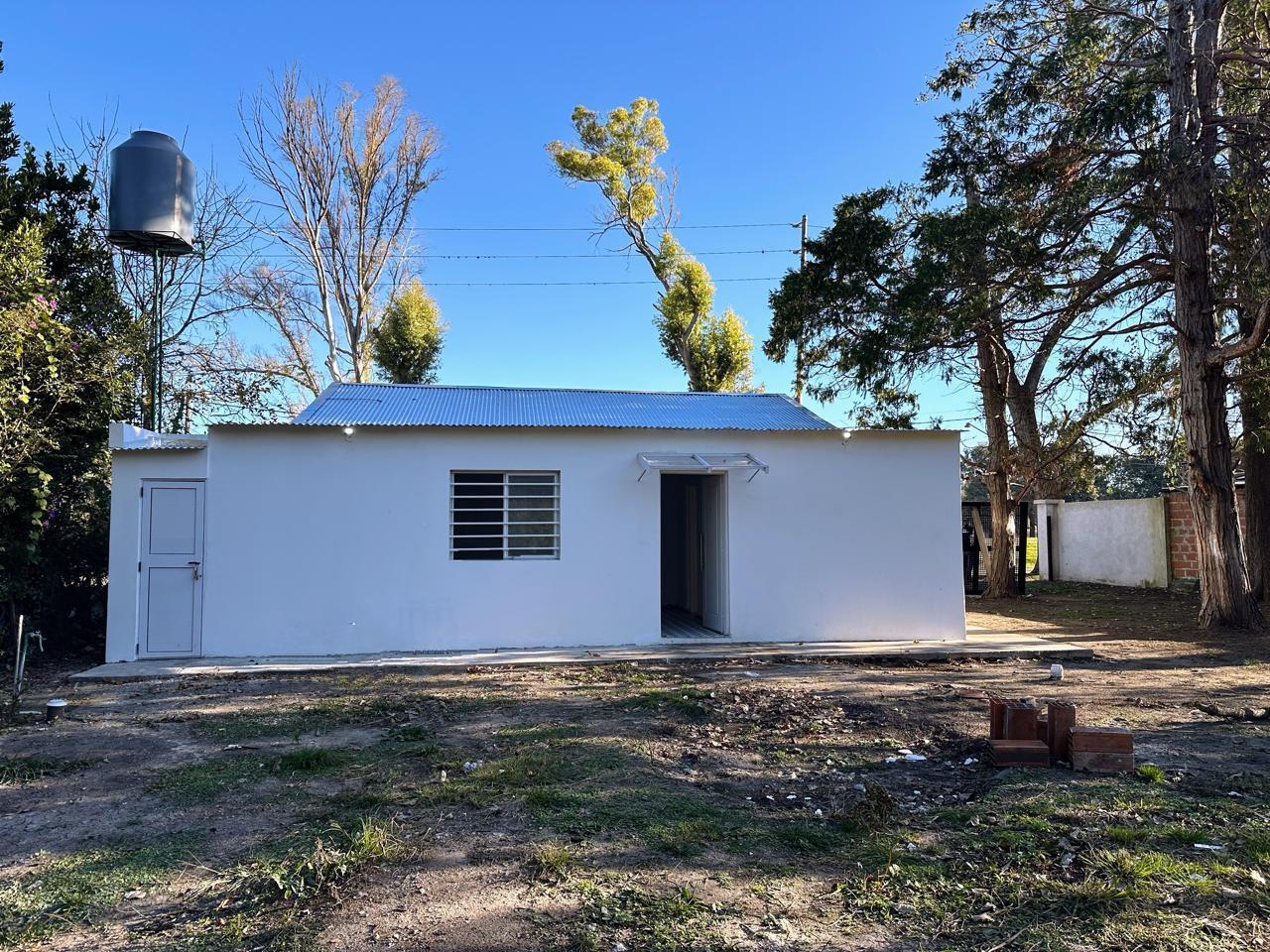 Foto de CASA + 2 LOCALES EN VENTA SOBRE TERRENO DE 1000M2, RUTA 2 KM52,ABASTO., imagen 2