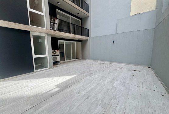 Foto de VENTA DEPARTAMENTO 2 AMBIENTES A ESTRENAR CON PATIO EN ALMAGRO, imagen 1