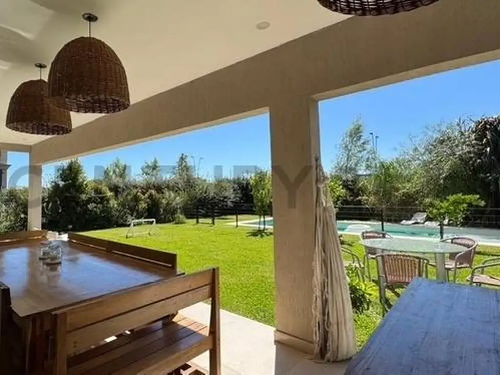 Foto de CASA DE 5 AMBIENTES - BARRIO CEIBOS PUERTOS DEL LAGO, imagen 2