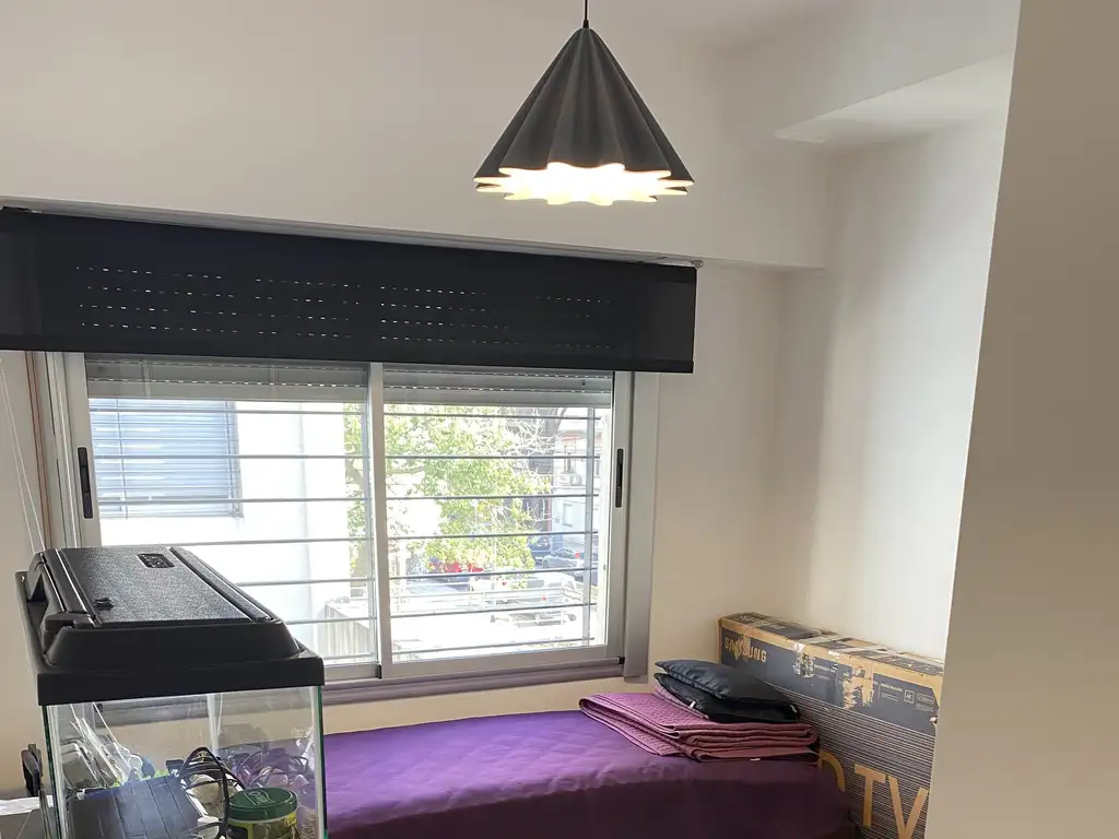 Foto de HERMOSO DEPARTAMENTO DE 4 AMBIENTES AL CONTRAFRENTE,COCHERA, PARRILLA, imagen 5