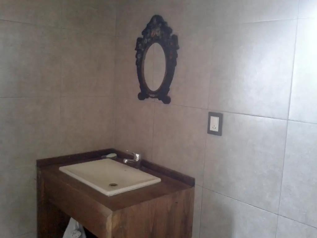 Foto de Hermosa casa PH de tres ambientes, con entrada pasante de auto, cochera, imagen 5