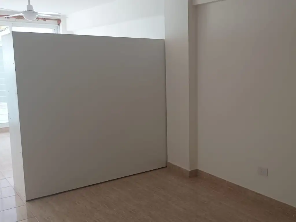 Foto de 1 ambiente divisible al contrafrente. Patio con quincho cubierto, imagen 5