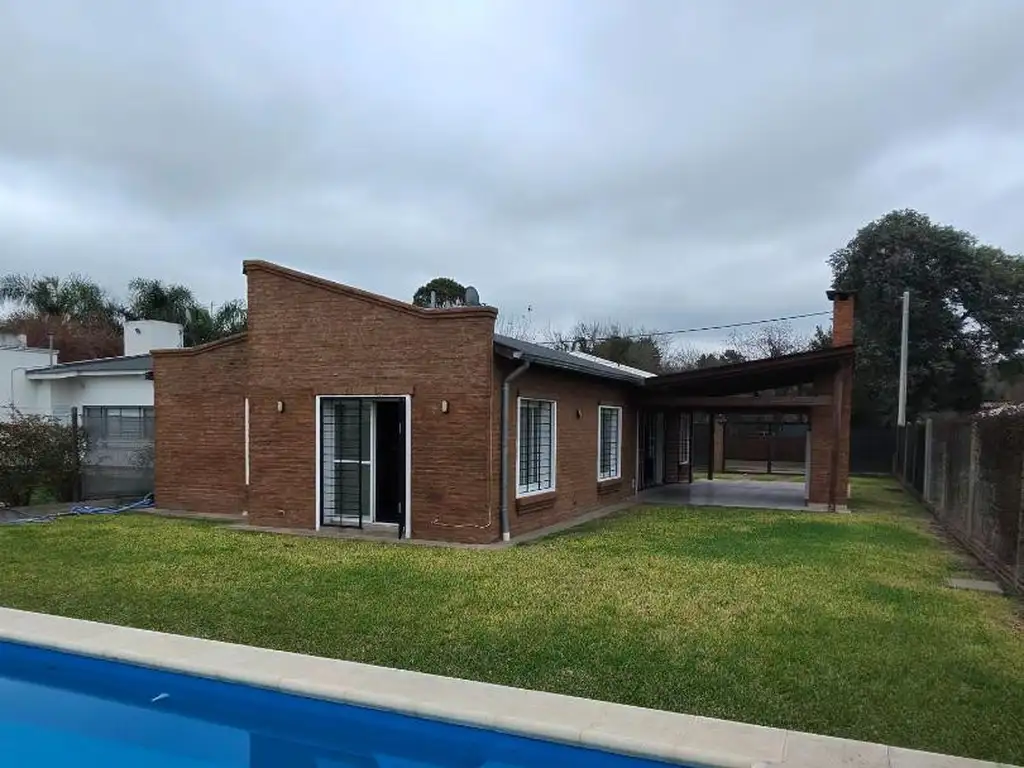 Foto de CASA DE DOS DORMITORIOS CON PISCINA- FUNES- ROLDAN, imagen 1
